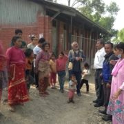 11174583_808075639290388_7034569351169249344_o Rotary Club of Patan members meeting villagers outside a community building
