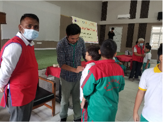 A medical team member examines a student during heart screening at Paathsala School, August 2026