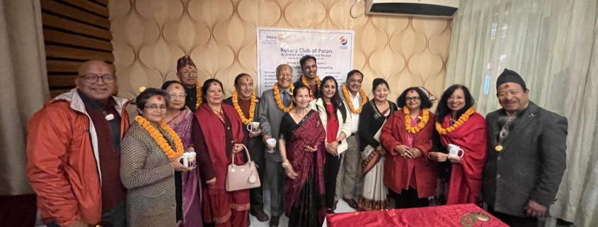 Rotary Club of Patan members and spouses celebrating a birthday fellowship