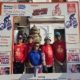 Five Rotary Club of Patan participants beneath the World Polio Day rally frame at Bhaktapur Durbar Square.