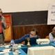 Rtn. Ewerhard Engels speaks into a microphone during his acceptance remarks at the Rotary Club of Patan meeting, 12 October 2026.