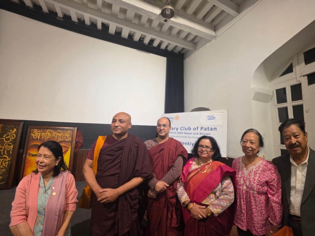 Rtn. Sandhya Regmi and guests with Venerable Monks Uttam Stabir and Vimalo Mahastabir at the Rotary Club of Patan meeting, 12 October 2026.