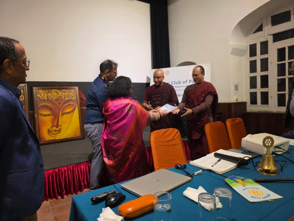Presentation to the Venerable Monks during the Faces of Buddha programme at the Rotary Club of Patan, 12 October 2026.