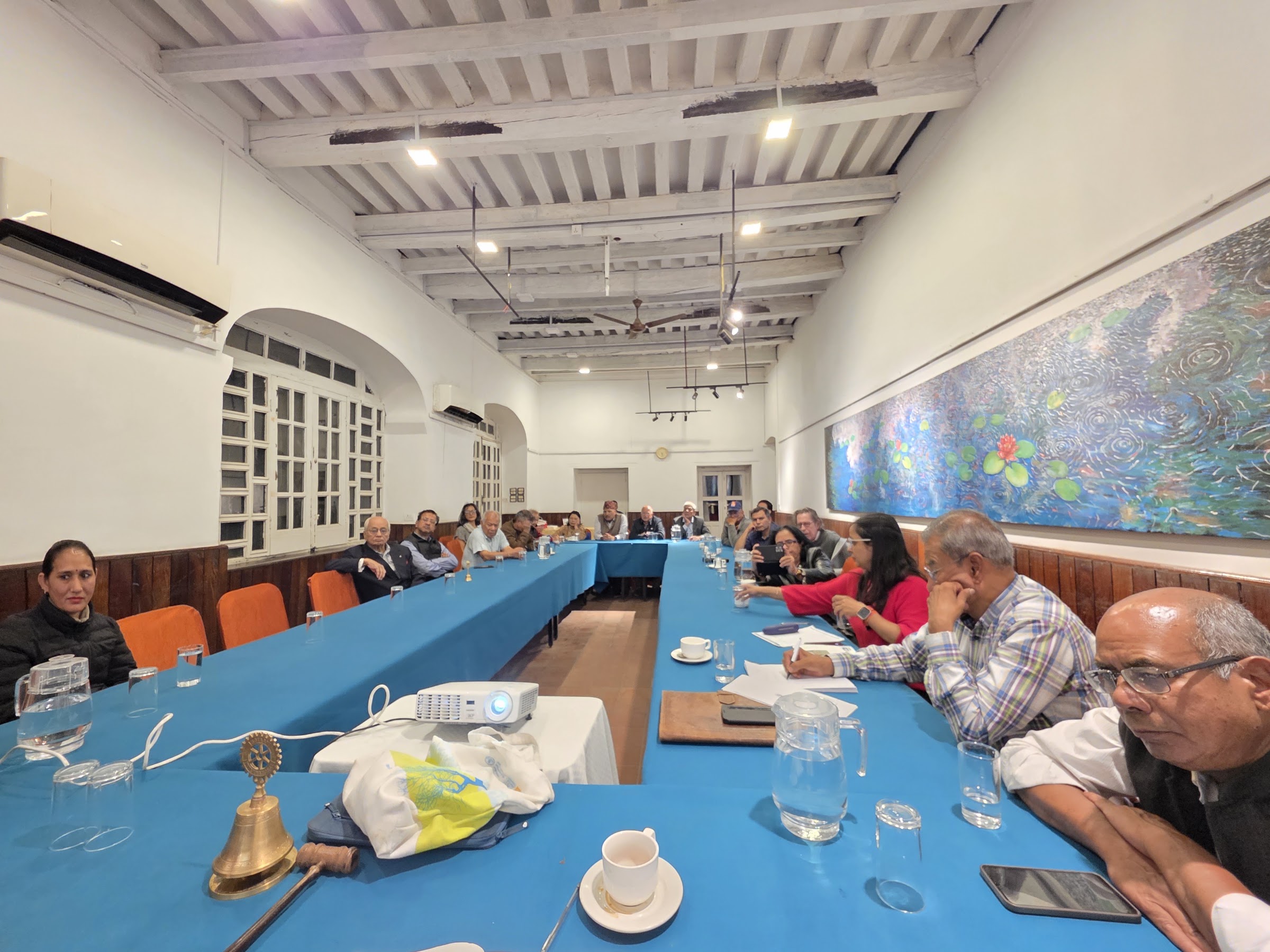 Members seated around the meeting table at Yala Maya Kendra for the World Polio Day meeting.